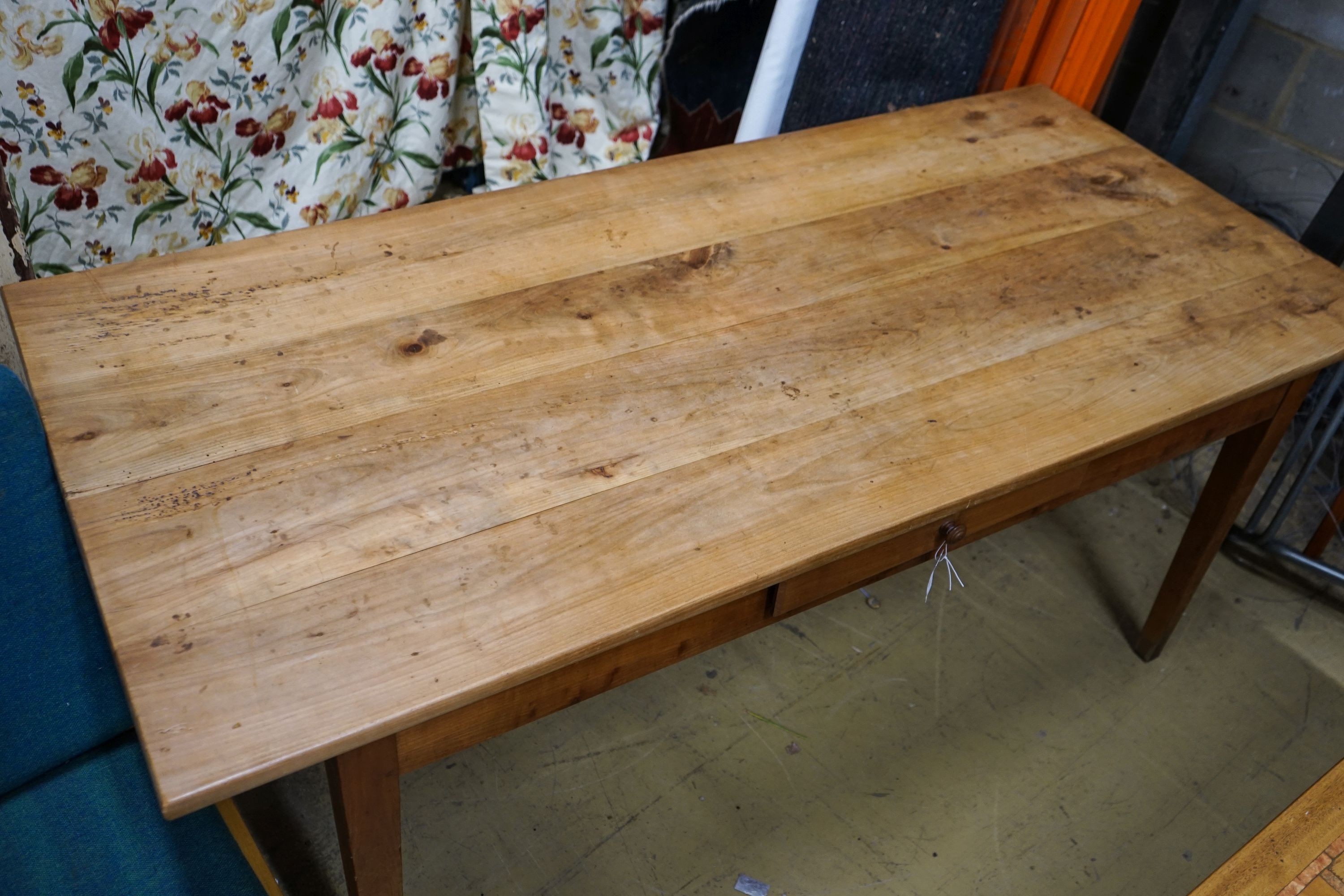 An early 19th century French cherry farmhouse table, fitted drawer, length 180cm, depth 82cm, height 76cm